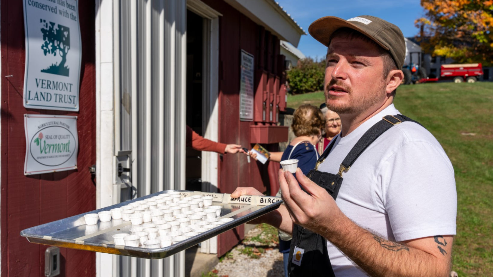 Farmer Passing Out Samples