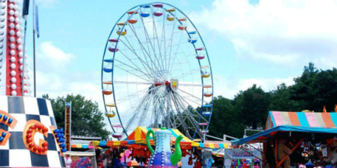 a fair with a ferris wheel