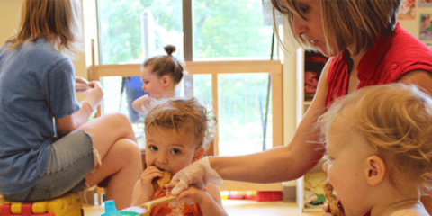 children eating in a childcare setting