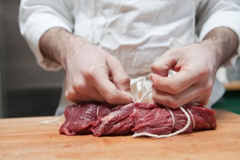 Picture of tying meat to cook