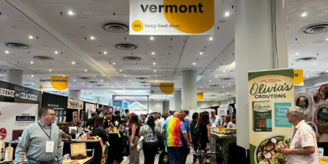 A crowd walking through the Vermont Pavilion at Summer Fancy Food Show