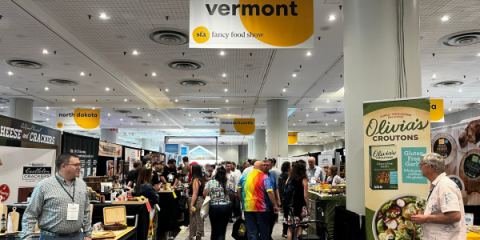 A crowd walking through the Vermont Pavilion at Summer Fancy Food Show