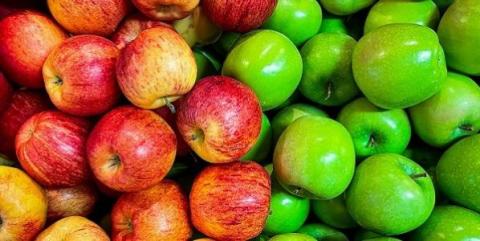 A picture of mottled red apples next to shiny green apples. Photo by James Yarema on Unsplash